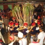 "Colorful Rongkar festival celebrations in Karbi Anglong, showcasing vibrant traditions, community unity, and spiritual rituals honoring nature and ancestors."