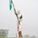 A statue of Kanaklata Barua holding the Indian National Flag, symbolizing her courage and sacrifice during the Quit India Movement in 1942.
