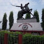 Statue of Bir Chilarai, the valiant general of the Koch dynasty, depicted on horseback with a raised sword, symbolizing his bravery and military excellence.