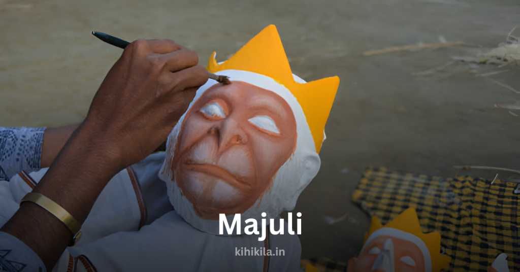 An artisan in Majuli carefully painting a handmade mask of Lord Hanuman, a vital part of Assam’s traditional Satriya culture and heritage.