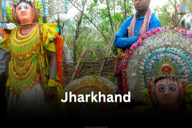 Traditional tribal performers in vibrant attire during a folk festival in Jharkhand.