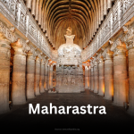 Ornate interior view of Ajanta Caves with carved pillars and a stupa.
