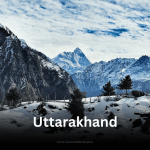 The snow-covered slopes of Auli, Uttarakhand, with a majestic view of the Himalayan peaks under a vast, cloudy sky.