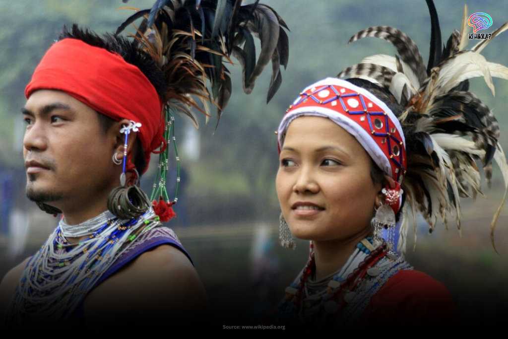 Fascinating Meghalaya: Matrilineal Traditions, Rainy Wonders & Must-Visit Tourist Hotspots Foodgrain Production Target A Garo man and woman in traditional attire with elaborate headgear and jewelry.