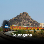Kacheguda AC Double Decker Express train passing through rocky landscape in Telangana