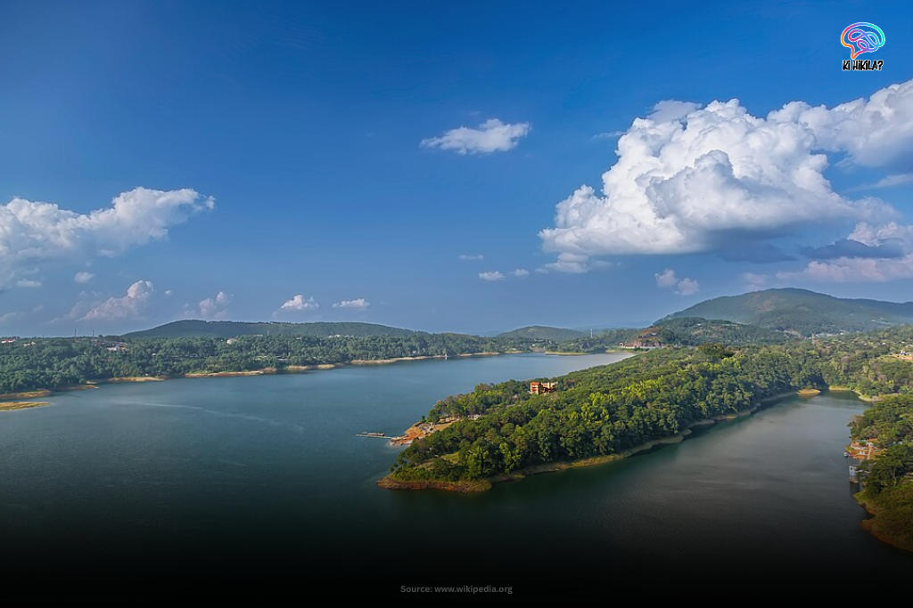 Fascinating Meghalaya: Matrilineal Traditions, Rainy Wonders & Must-Visit Tourist Hotspots Foodgrain Production Target A panoramic view of Umiam Lake surrounded by hills and forests in Meghalaya.