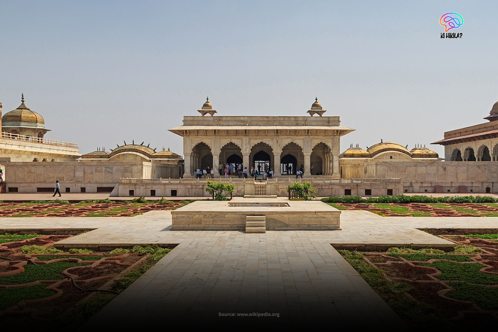 Incredible Uttar Pradesh: A Fascinating Guide to Its History, Culture, Economy & Travel for Curious Learners A view of the white marble pavilion inside Agra Fort with visitors walking around the garden courtyard.