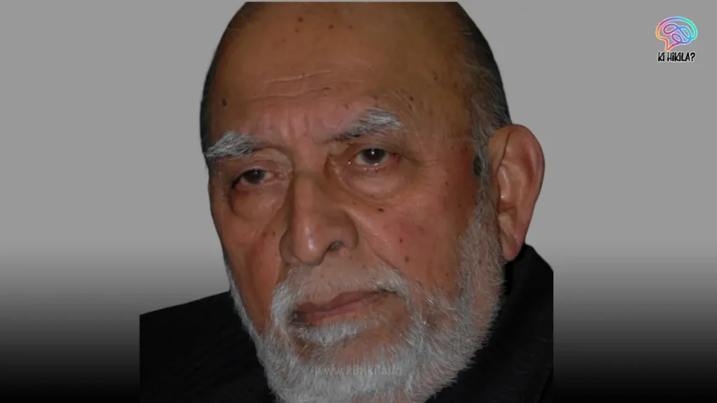  A close-up portrait of MR Srinivasan, a senior nuclear scientist, with a white beard and glasses,