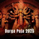 An ornate and colorful idol of Goddess Durga with her ten arms, riding a lion and slaying the demon Mahishasura, surrounded by other deities.