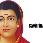 A colored portrait of Savitribai Phule, an Indian social reformer and poet, wearing a red saree and a nose ring.