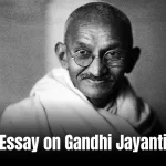 Essay on Gandhi Jayanti: A peaceful scene of people holding candles and chanting, with a portrait of Mahatma Gandhi in the background.