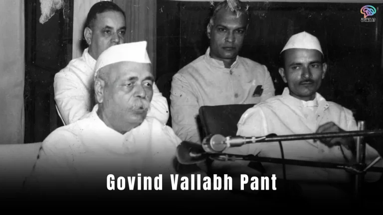Govind Vallabh Pant: A vintage black-and-white photo of a man in a suit and turban, speaking at a podium.