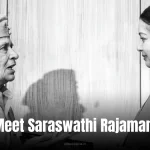 Saraswathi Rajamani: A black-and-white photograph of an elderly woman in military uniform conversing with a younger woman in traditional attire, against a wooden backdrop.
