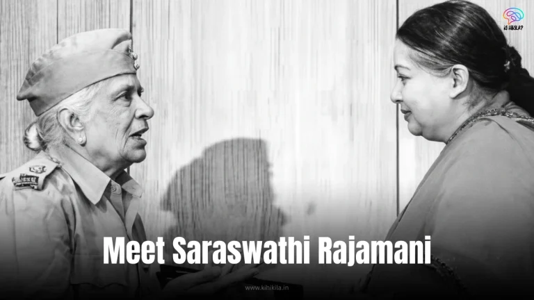 Saraswathi Rajamani: A black-and-white photograph of an elderly woman in military uniform conversing with a younger woman in traditional attire, against a wooden backdrop.